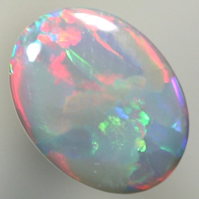 SOLID SEMI BLACK OPAL Rolling flashes of red and green turquoise 